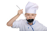 Young chef tasting food