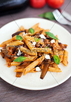 Pasta with tomato sauce, eggplant and ricotta cheese