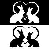 Monochrome silhouette of two rabbits and a heart