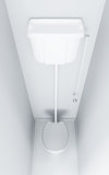 white ceramic toilet in surroundings light walls