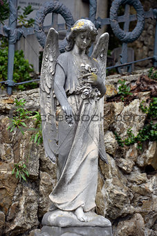 Angel on tombstone on old cemetery