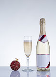 Champagne glass, bottle, and New Year decoration 