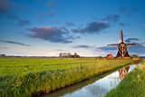 Dutch windmill at sunrise