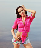 Young brunette in pink shirt