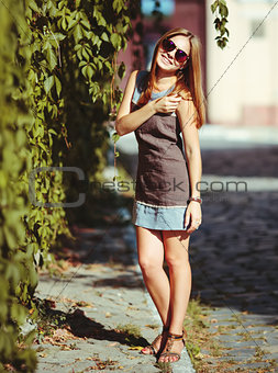 beautiful teenage girl in sunglasses.