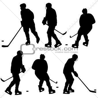 Set of silhouettes of hockey player. Isolated on white. Vector  