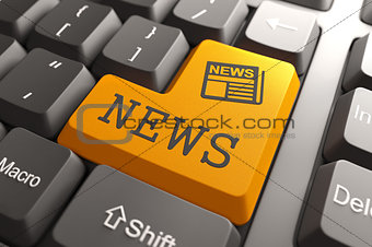 News Concept on Orange Keyboard Button.