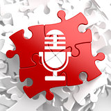 Microphone Icon on Red Puzzle.