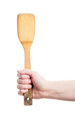 Hand holding kitchen spatula