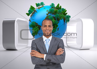 Composite image of charismatic young businessman with arms crossed