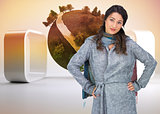 Composite image of serious pretty brunette wearing winter clothes posing