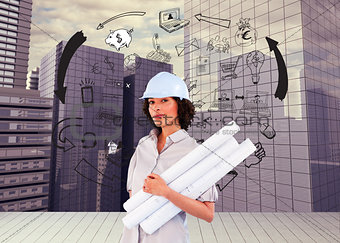 Composite image of confident woman holding construction plans