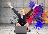 Composite image of businesswoman sitting in front of laptop with arms up