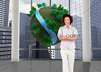 Composite image of businesswoman with crossed arms