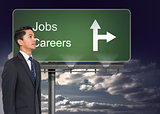 Composite image of signpost showing the direction of jobs and careers