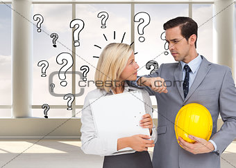 Composite image of architects with plans and hard hat looking at each other