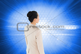 Composite image of unsmiling asian businesswoman