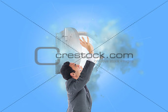 Composite image of stressed businessman with arms raised