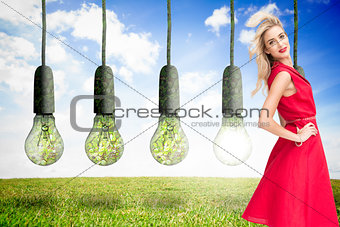 Composite image of happy blonde posing