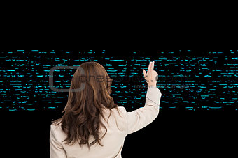 Composite image of brunette businesswoman standing back to camera