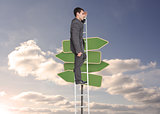 Composite image of stern businessman standing on ladder