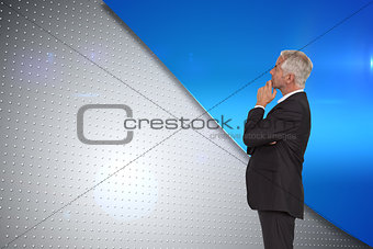 Composite image of thoughtful mature businessman posing