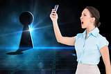 Composite image of angry classy businesswoman yelling at her smartphone