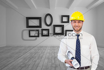 Composite image of cheerful young architect posing
