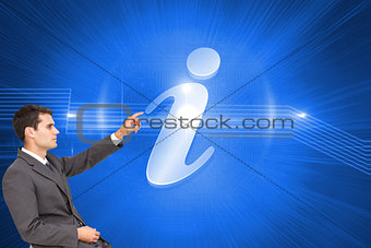 Composite image of businessman sitting and pointing the finger