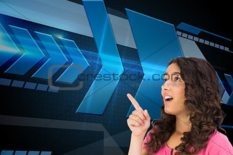 Composite image of surprised brown haired woman pointing out