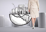 Composite image of classy businesswoman walking away from camera