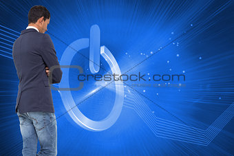 Composite image of unsmiling casual businessman with arms crossed