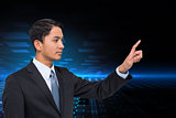 Composite image of stern asian businessman pointing