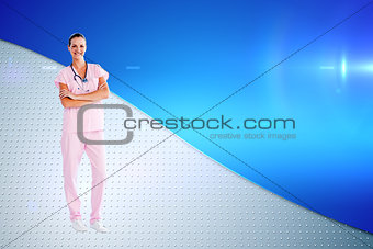 Composite image of beautiful nurse standing in front of the camera with folded arms