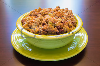 Turkey Stuffing in Green Bowl on Wood Table