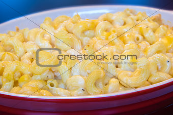 Macaroni and Cheese in Red Dish Closeup