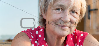 Portrait of the elderly woman.