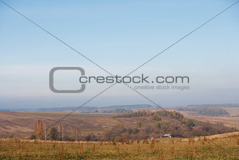 Landscape with field and sky in Autumn