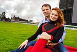 Outdoor happy couple in love posing in Museum Plein, autumn Amst