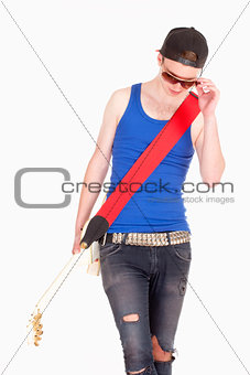 Teenage Boy with Sunglasses and Electric Guitar