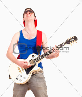 Teenage Boy with Sunglasses Playing Electric Guitar 
