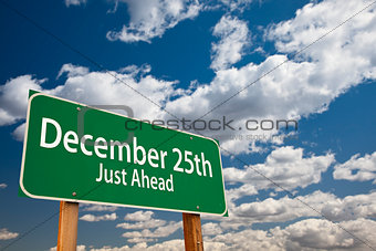 December 25th Just Ahead Green Road Sign Over Sky