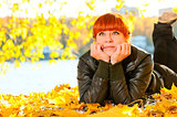 beautiful girl with red hair in  park