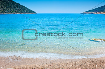 idealistic sea cove with turquoise water