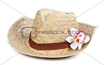 straw hat with a flower orchid