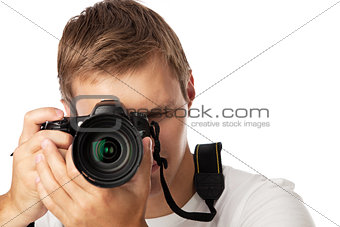Closeup portrait of a young man taking a picture over white