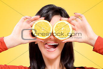 woman with oranges in front of your eyes