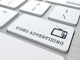 Video Advertising on White Keyboard Button.