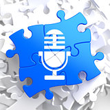Microphone Icon on Blue Puzzle.
