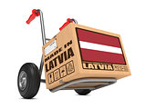 Made in Latvia - Cardboard Box on Hand Truck.